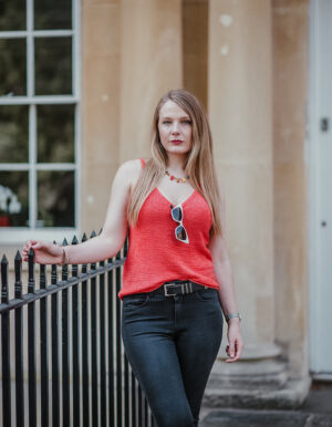 Pink top with jeans hotsell